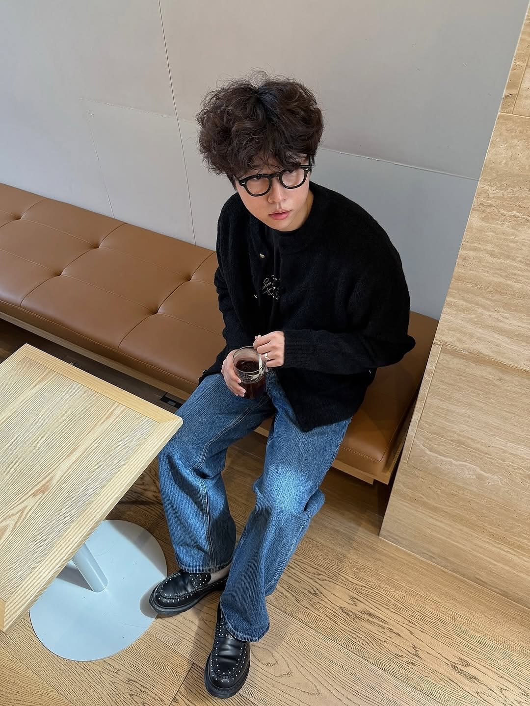 Photo by AMOUPRE 아모프레 on October 10, 2025. May be an image of duffle coat, wingtip shoes, turtleneck and text.