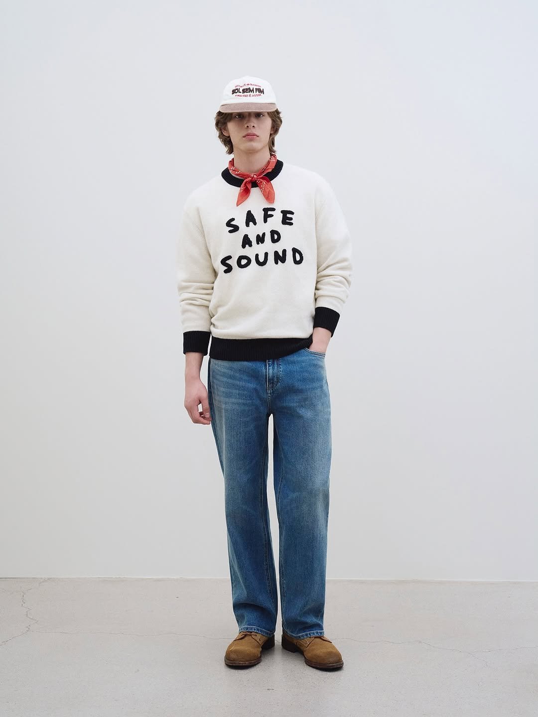 Photo by AMOUPRE 아모프레 on November 28, 2025. May be an image of one or more people, people standing, hat, sweatpants, sweater and text that says 'SCLSEMAN SAFE A AND A SOUND'.