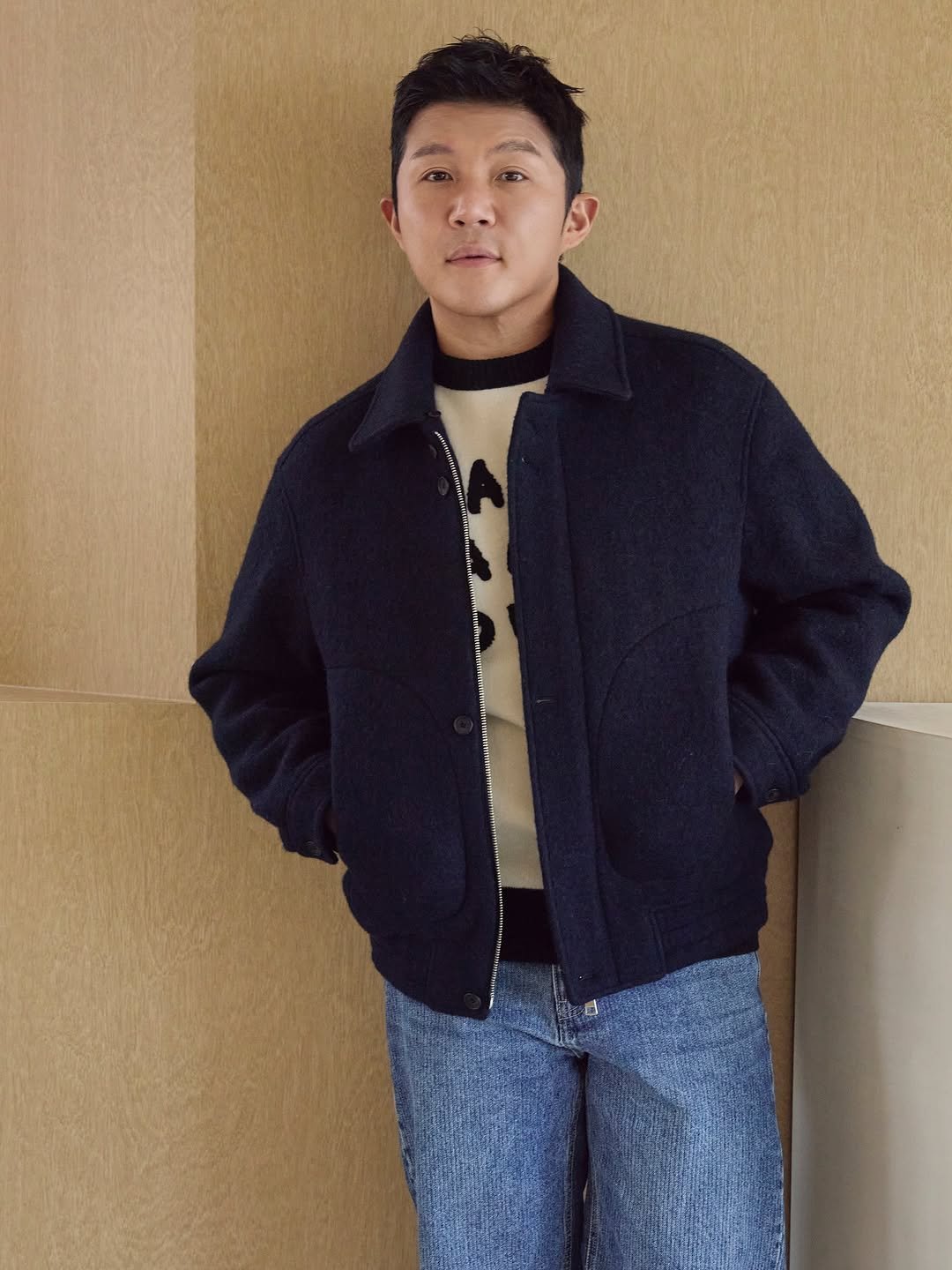 Photo by AMOUPRE 아모프레 on October 22, 2025. May be an image of duffle coat, parka, flight jacket and text.