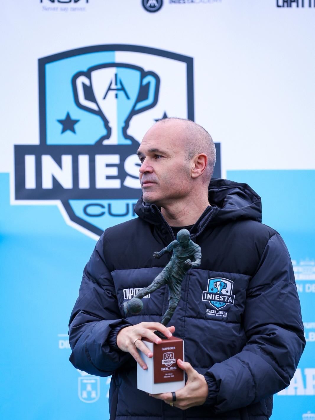 Photo shared by Iniesta Cup on December 09, 2025 tagging @caixabank, @andresiniesta8, @gobjccm, @marca, @imd_albacete, @besoccer, @frutas.torres, @tarracocenter, @aytoalbacete, @iniestacademy, @centroporschemurcia, @movistarplus, @segurossoliss, @escueladefutbolalbacer, @weare_nsn, @dipualba, and @coralfertilizantes. May be an image of soccer, football, sports equipment, stadium and text.