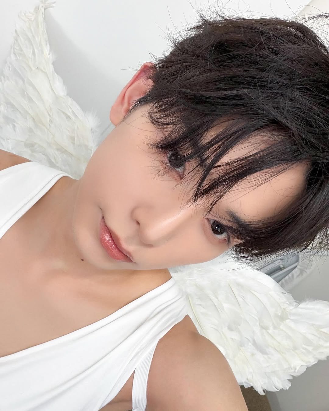 Photo by &TEAM on March 28, 2026. May be an image of one or more people, bangs, costume and text.