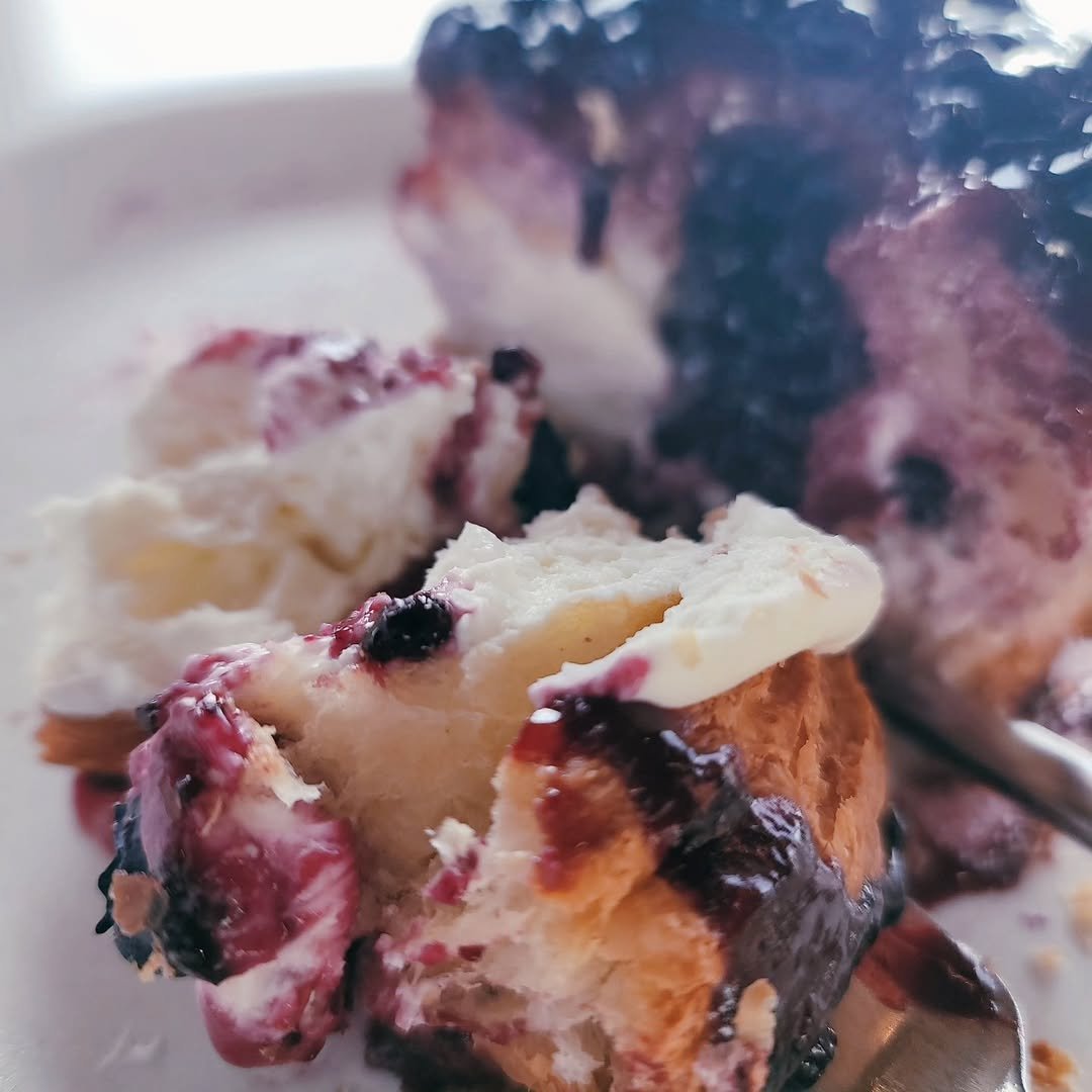 Photo by 안준하 on December 15, 2025. May be an image of biscuit, blueberries, whipped cream, scone and text.