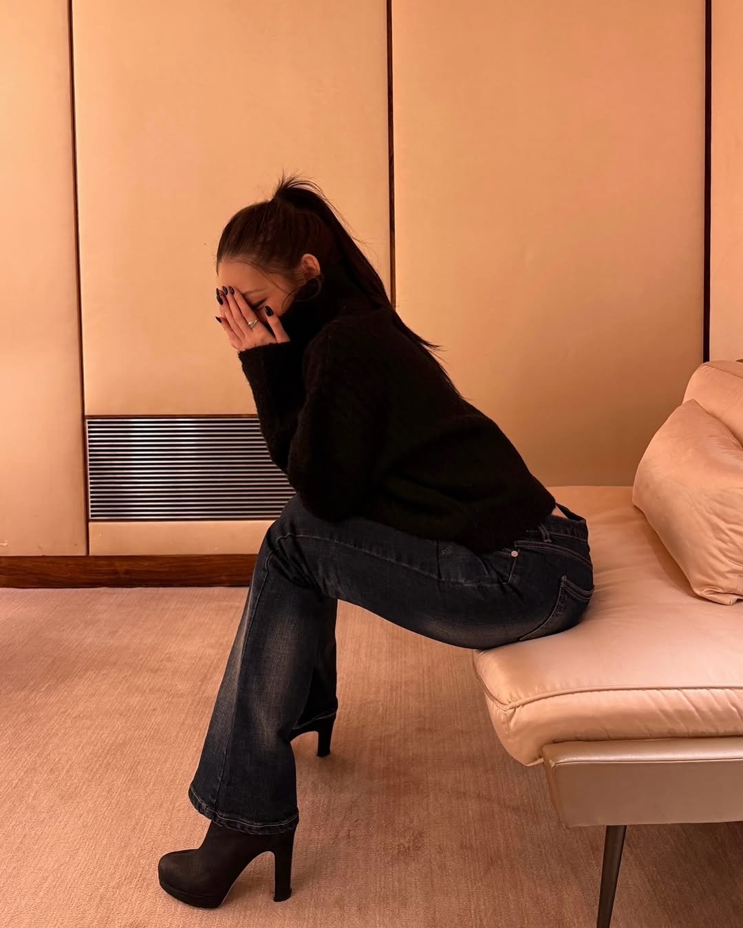 Photo by ANNIE on February 22, 2026. May be an image of turtleneck, boots and text.