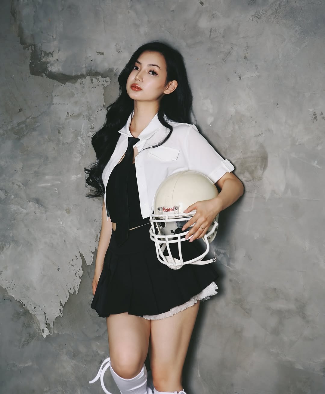 Photo by Anu Ujin on July 06, 2025. May be an image of 1 person, playing football, miniskirt, football helmet and text.