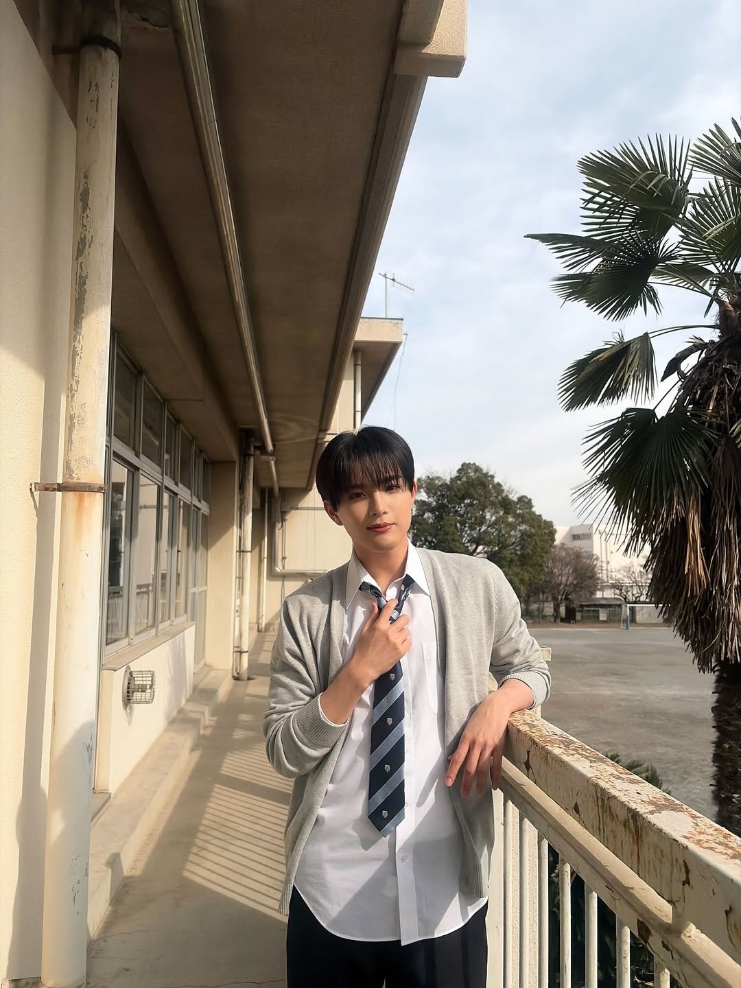 Photo by aoen on March 16, 2026. May be an image of duffle coat, bolo tie, suit and text.