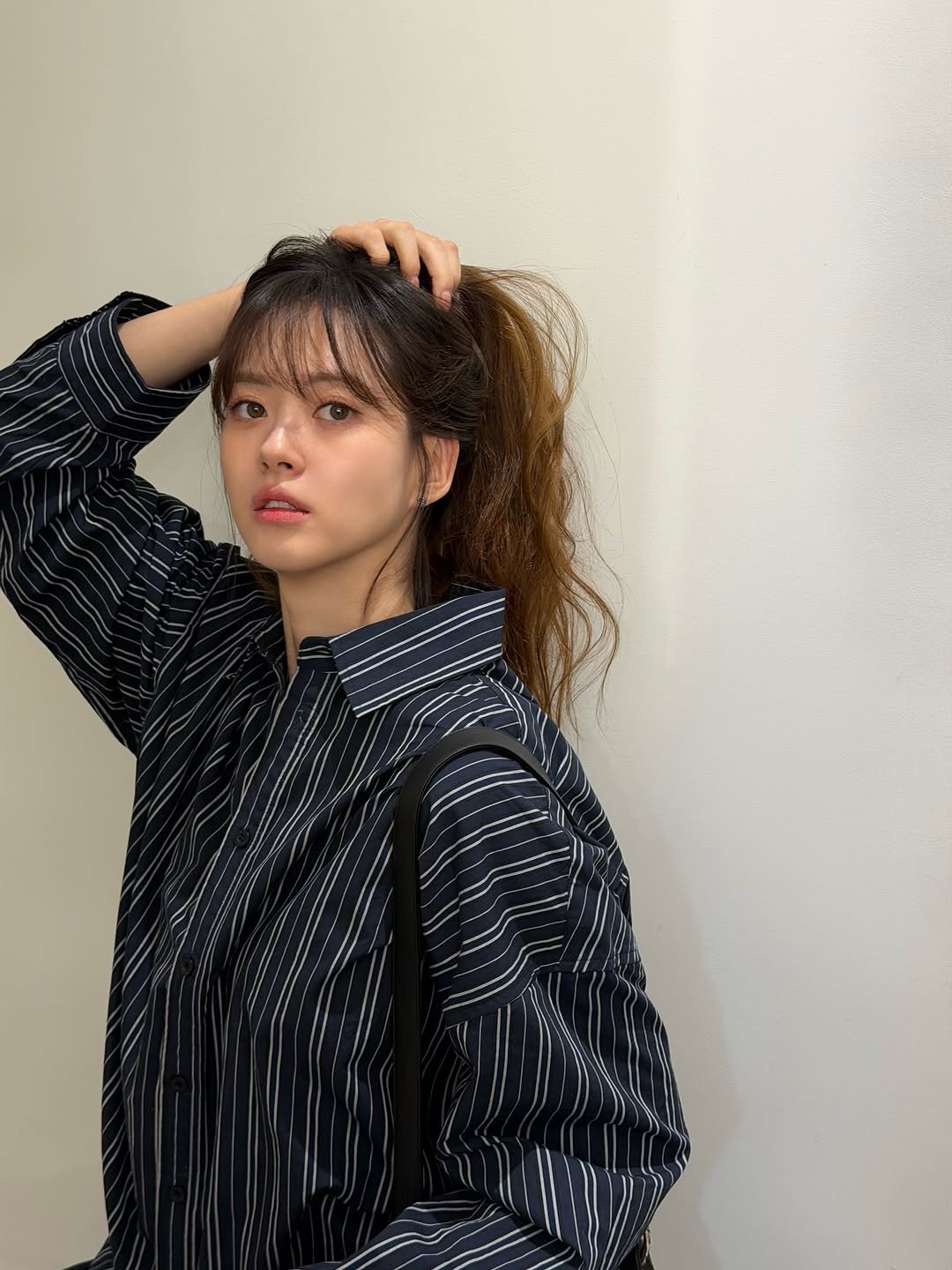 Photo by 고아라 on February 04, 2026. May be an image of one or more people, hair, jacket, top and text.