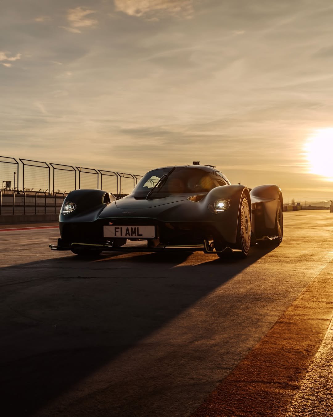 Photo by Aston Martin on January 01, 2026. May be an image of racing vehicles, race car, wheel, road and text.