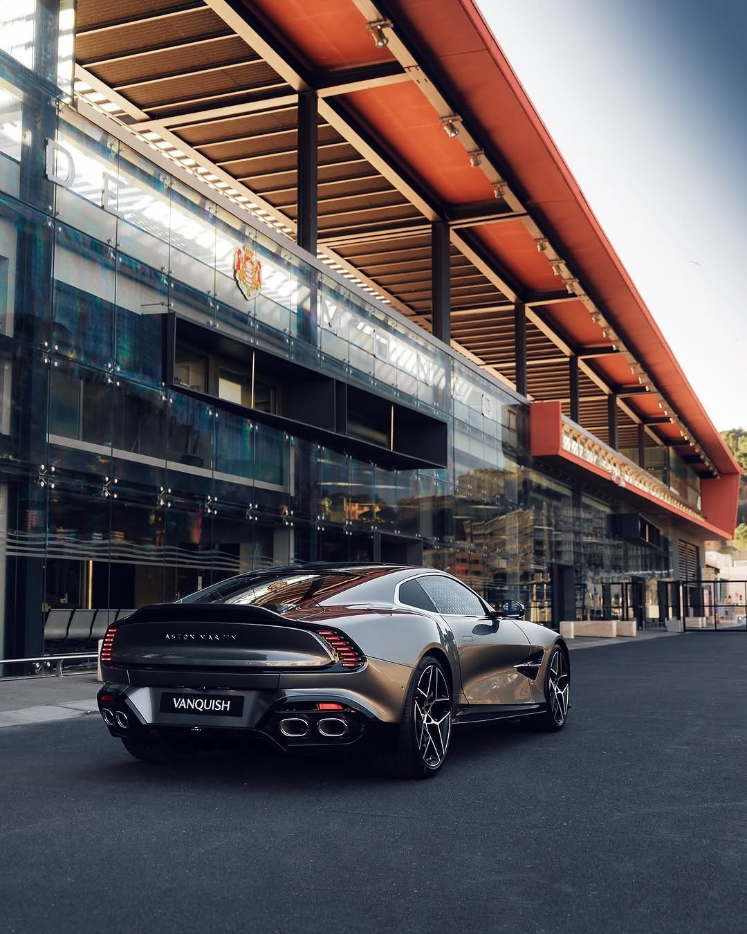 Photo by Aston Martin on December 28, 2025. May be an image of wheel, race car, road and text.