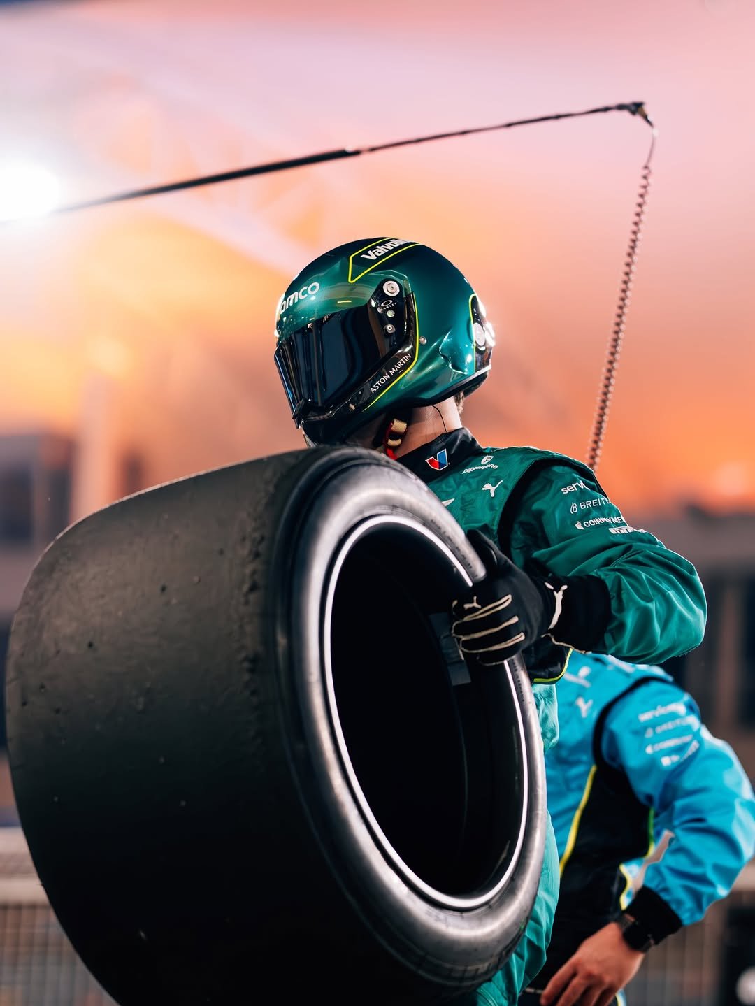 Photo by Aston Martin Aramco Formula One™ Team on February 17, 2026. May be an image of racing vehicles, race car, wheel, helmet and text.