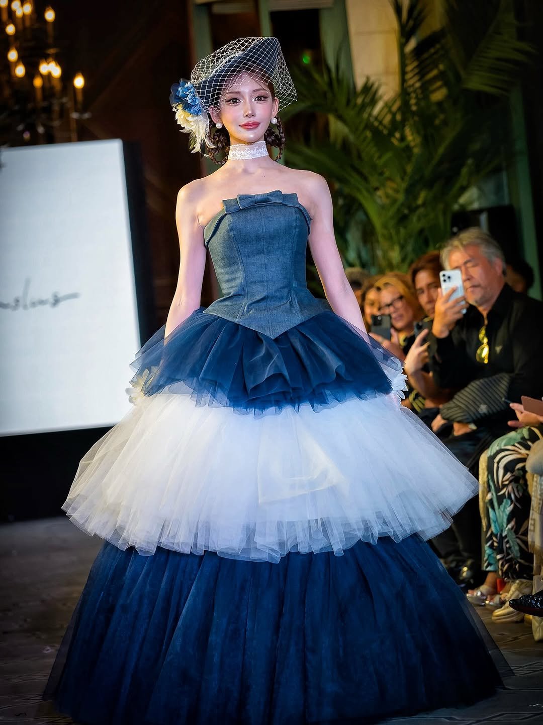 Photo shared by 明日花キララ on October 08, 2025 tagging @linslus_official. May be an image of 2 people, gown, dress and text.