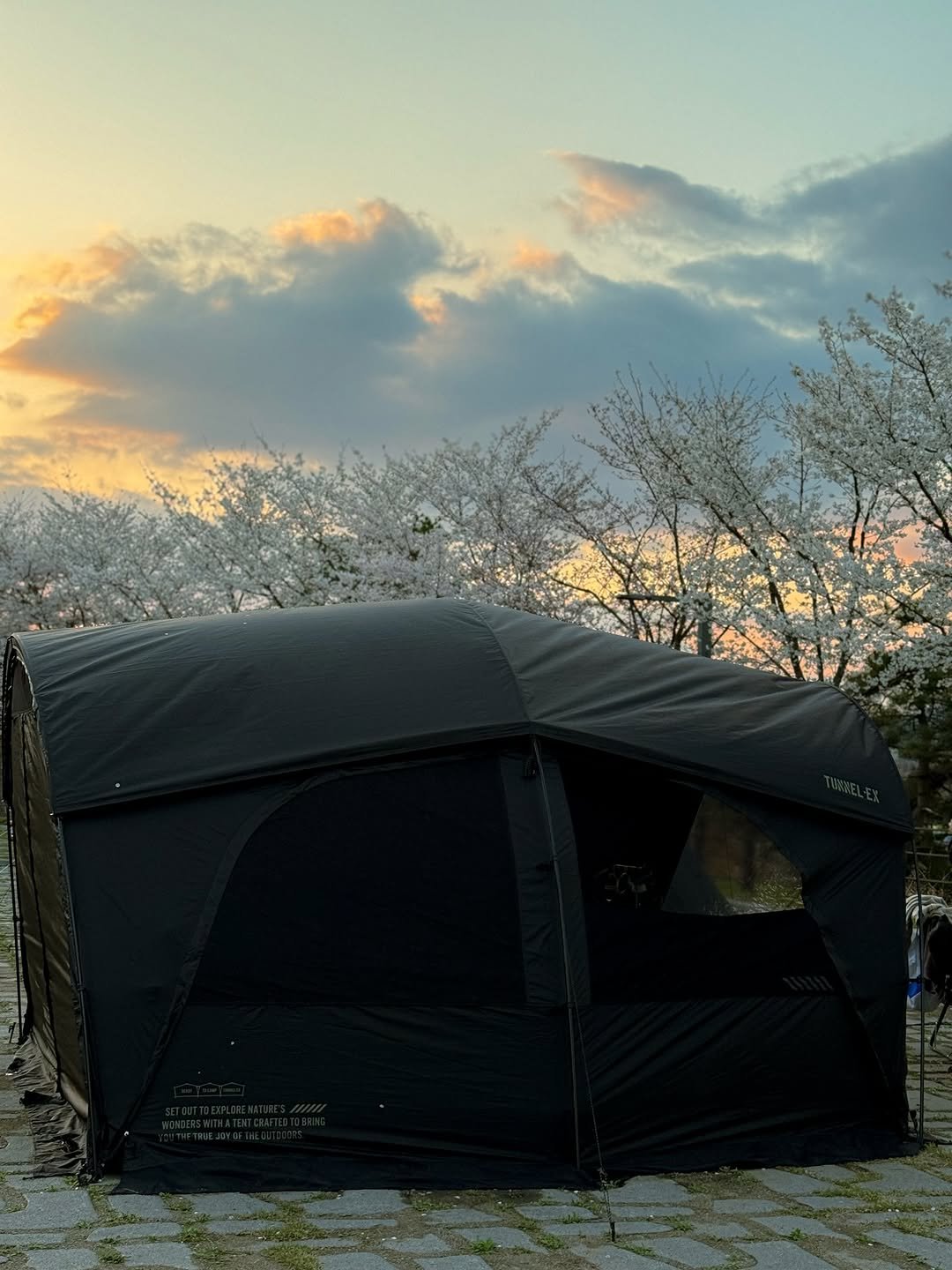 Photo shared by 니맘캠핑 on April 23, 2026 tagging @cargo_container. May be an image of campsite, twilight, outdoors and text.
