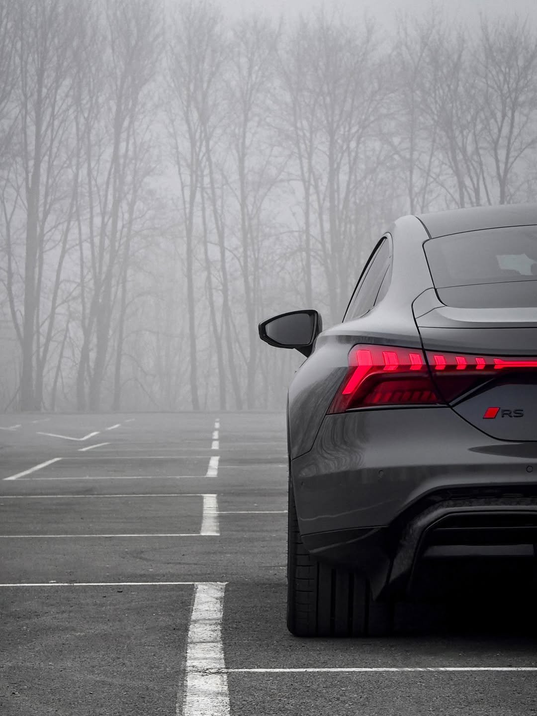 Photo by Audi Sport on January 09, 2026. May be an image of sedan, wheel, road, fog and text.