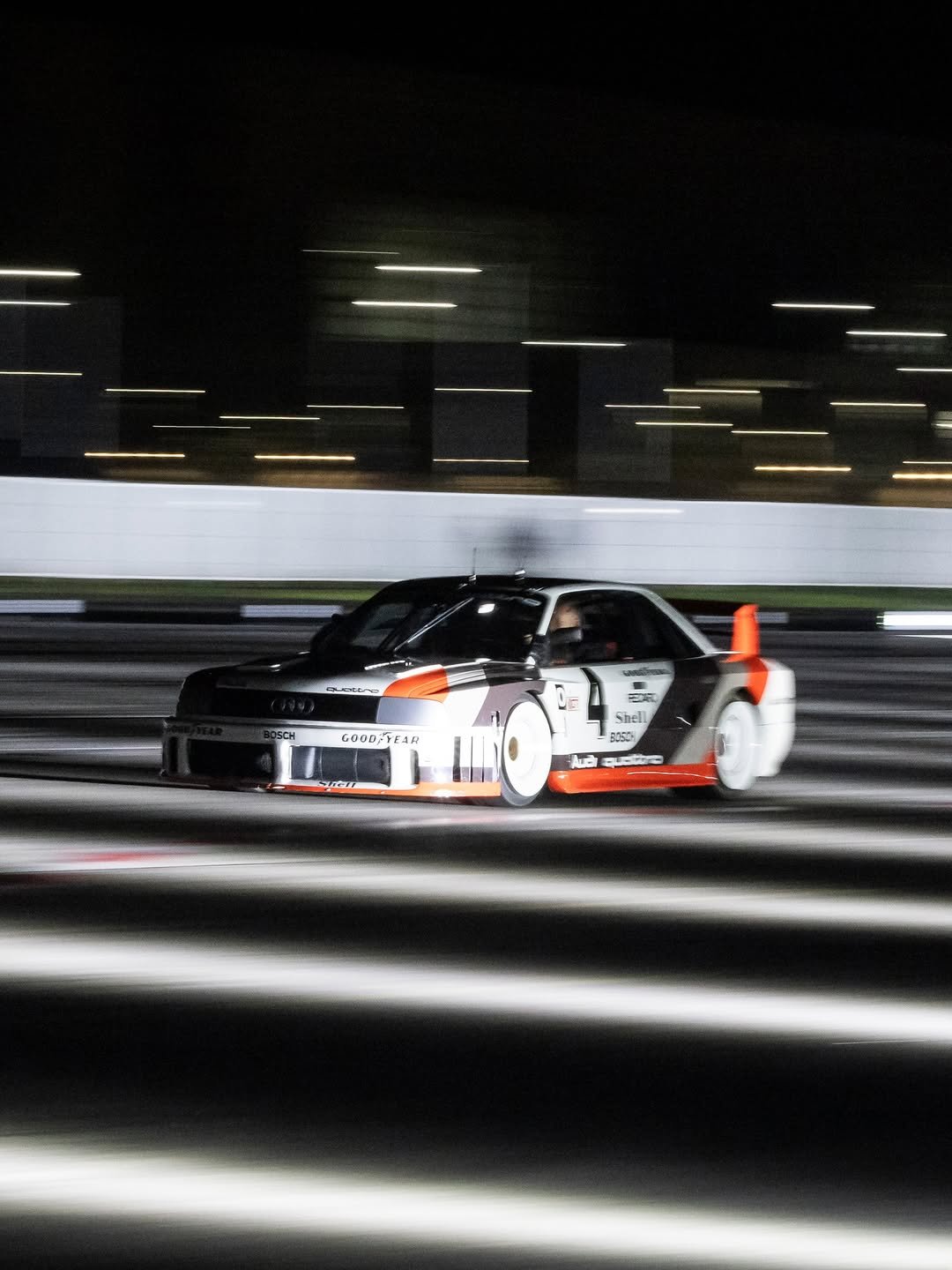 Photo shared by Audi Sport on November 22, 2025 tagging @auditradition, @strietzelstuck, and @audif1. May be an image of race car and text.