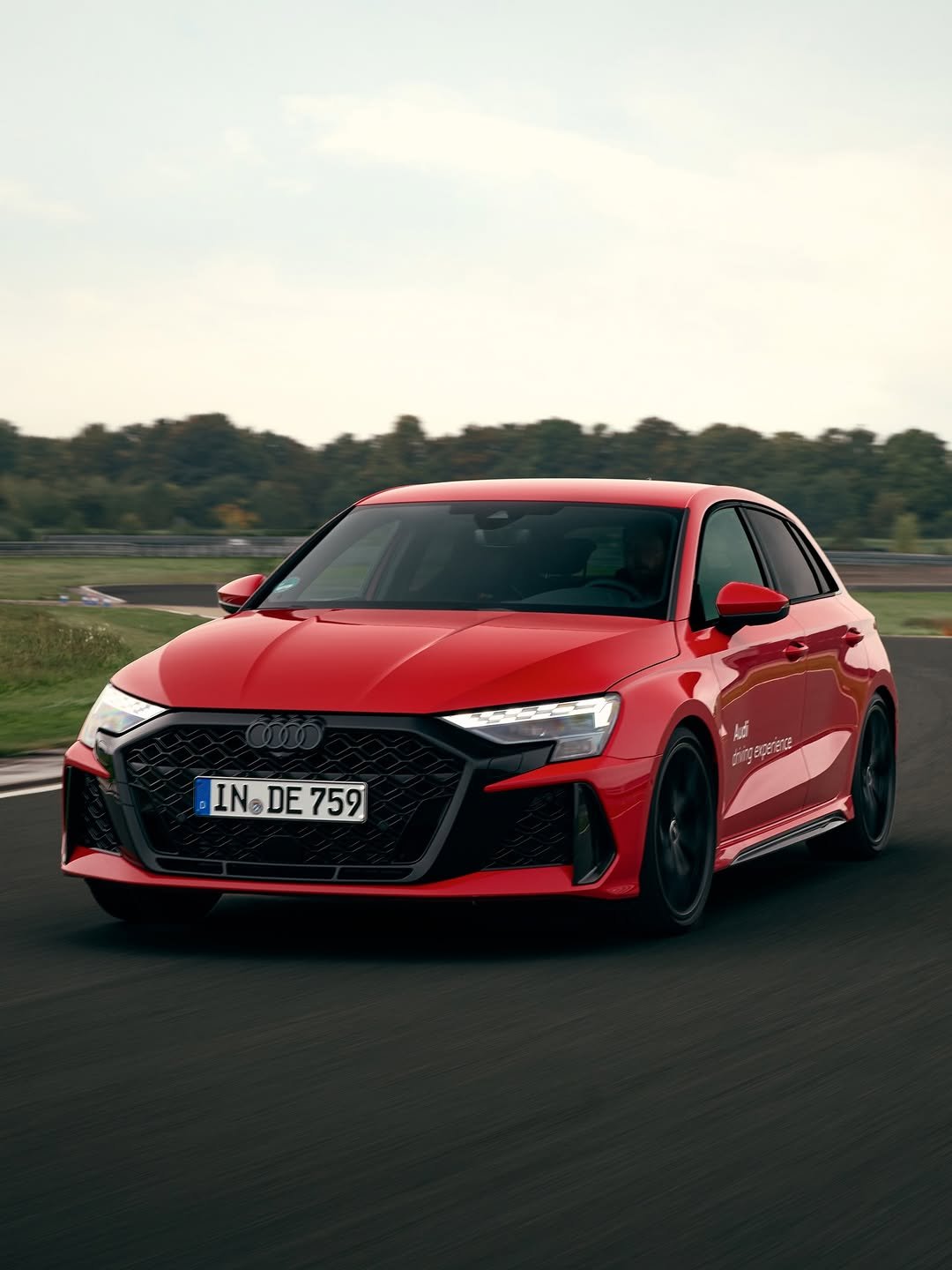 Photo by Audi Sport on January 03, 2026. May be an image of sedan, wheel, road and text.