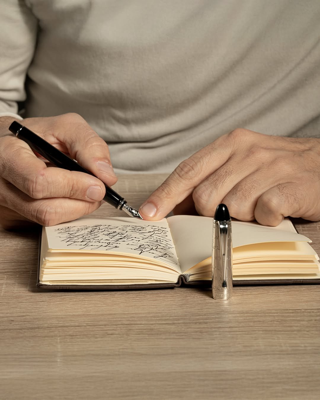 Photo by Aurora Pen on September 11, 2025. May be an image of 1 person, book, diary, pen and text.