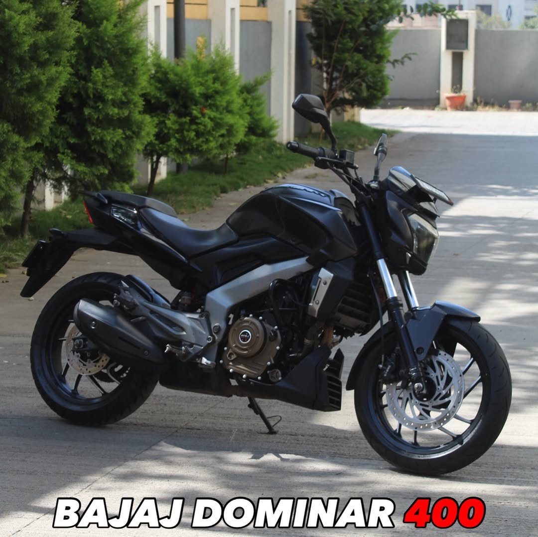 Photo by Autologymotors on January 11, 2026. May be an image of scooter, motorcycle, wheel and text that says 'BAJAJ DOMINAR 400'.