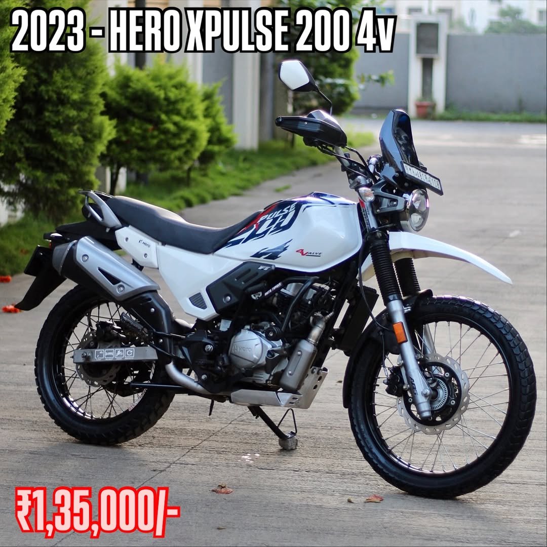 Photo by Autologymotors on November 06, 2025. May be an image of ‎dirt bike, motorcycle, scooter and ‎text that says '‎2023 2023-HER -HERO XPULSE 200 4ν RHHo RAN o ® ن 63四 M ₹1,35,0001- ,000/- ₹1,35,‎'‎‎.