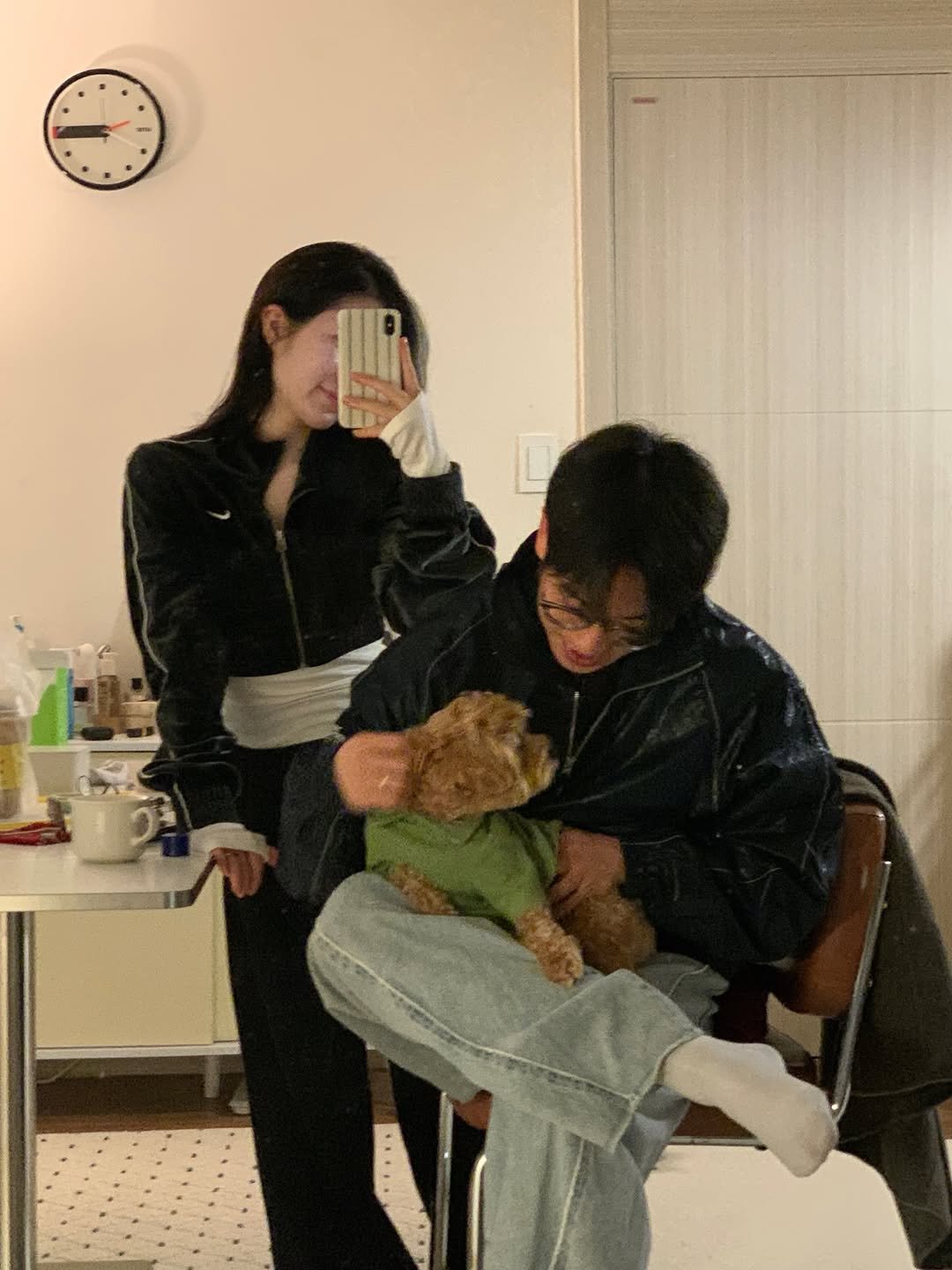 Photo by 영아 on February 15, 2026. May be an image of one or more people, Norwich terrier, sling and text.