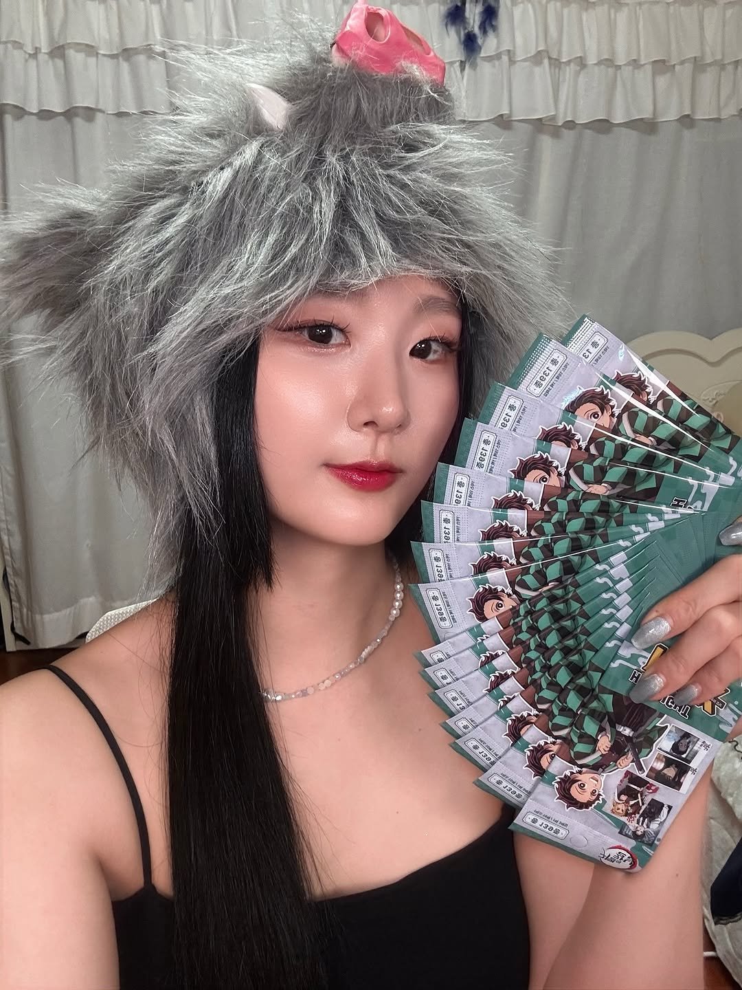 Photo by 고경 on August 26, 2025. May be an image of 1 person, braids, hat, headdress, parasol and text.