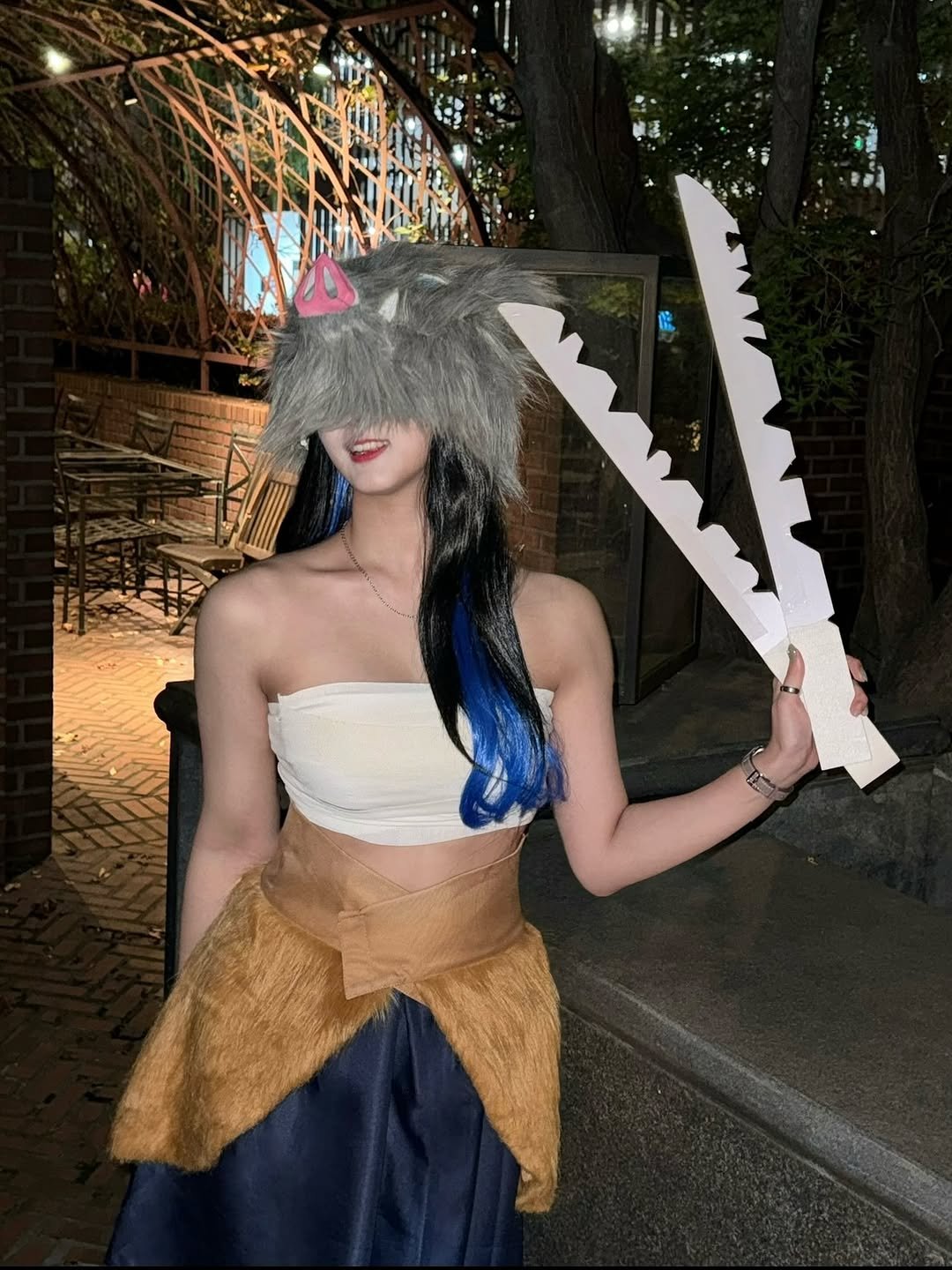 Photo by 고경 on August 24, 2025. May be an image of 1 person, sword, costume, headdress and text.