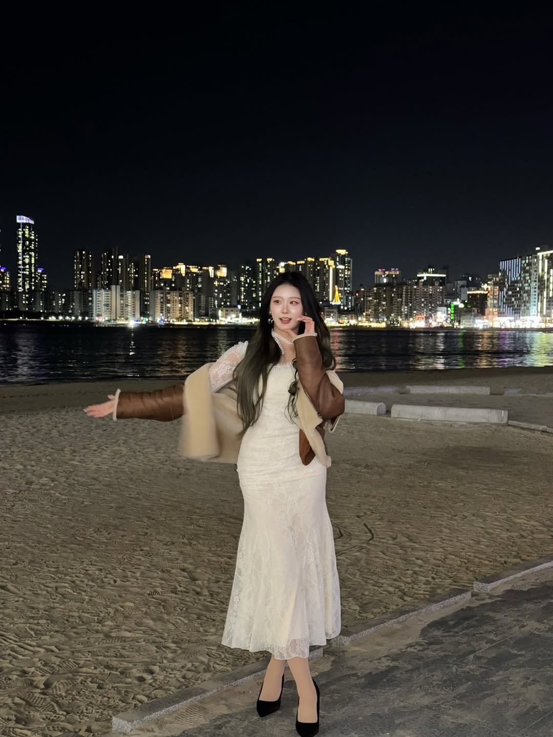 Photo by 고경 on December 21, 2025. May be an image of dress, night and text.