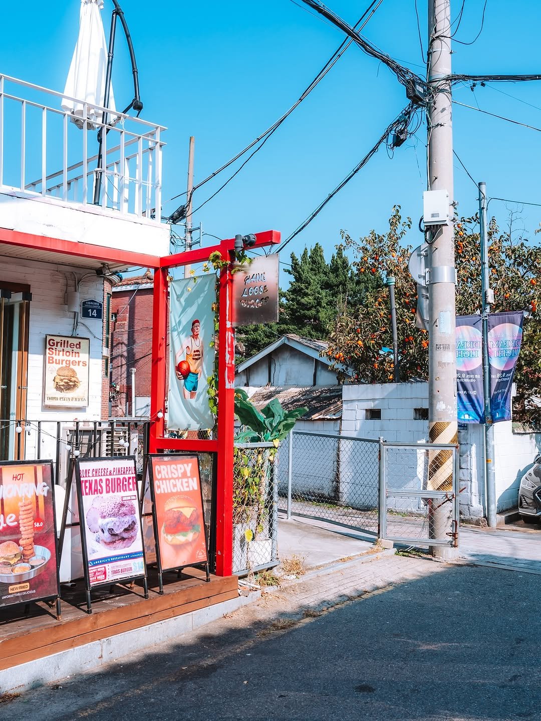 Photo shared by 빈백 | CHANG SU, OH on November 08, 2025 tagging @trazy_korea, @sonykorea, @suwon_city, and @sonyalpha. May be an image of signboard, street, telephone pole and text.