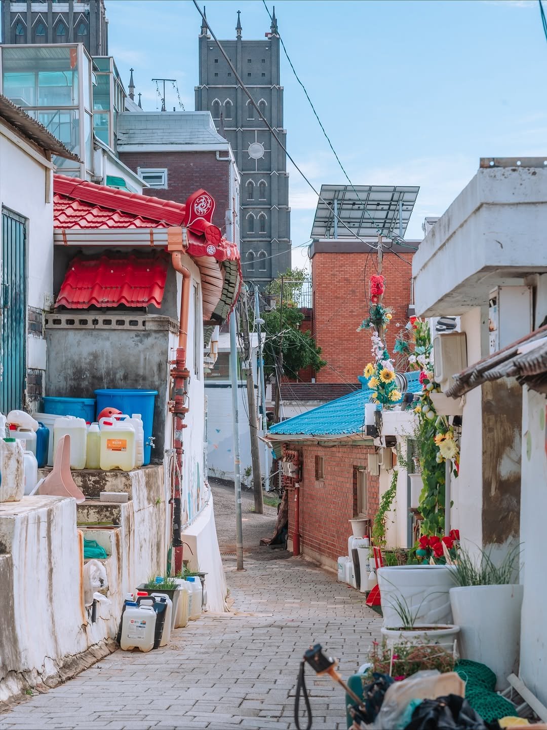 Photo shared by 빈백 | CHANG SU, OH on September 23, 2025 tagging @suwon_city. May be an image of street, buildings and text.