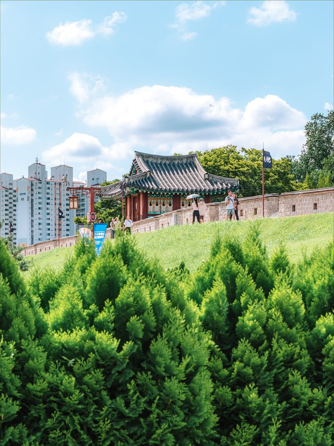 Photo shared by 빈백 | CHANG SU, OH on September 19, 2025 tagging @suwon_city. May be an image of 4 people, Gyeongbokgung Palace, outdoors and text.