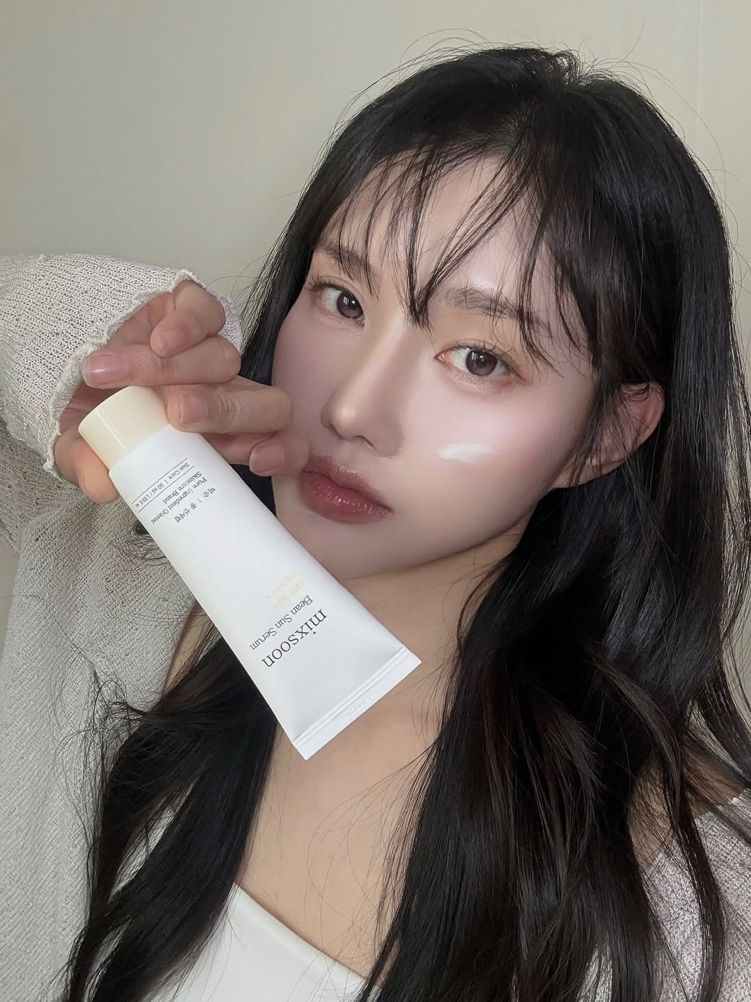 Photo shared by 변민서 on March 29, 2026 tagging @mixsoon_official. May be an image of one or more people, makeup, hair product, hand cream, lotion and text.