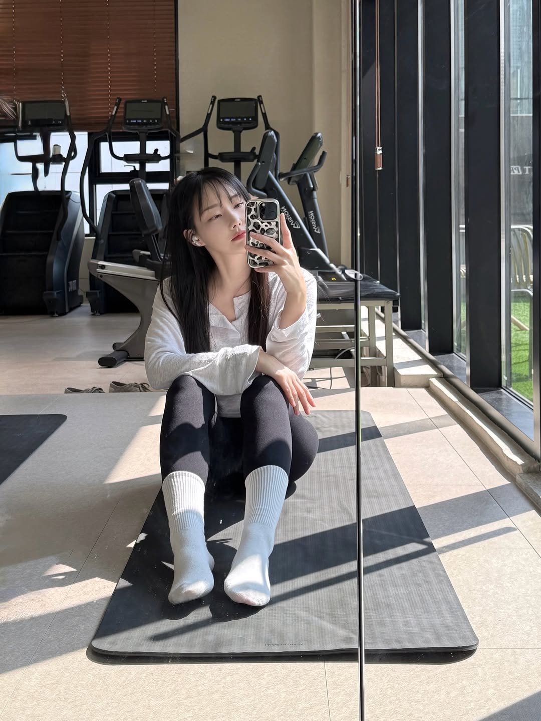 Photo shared by 변민서 on March 13, 2026 tagging @redfit.premium. May be an image of mirror, sweatpants, boots and text.