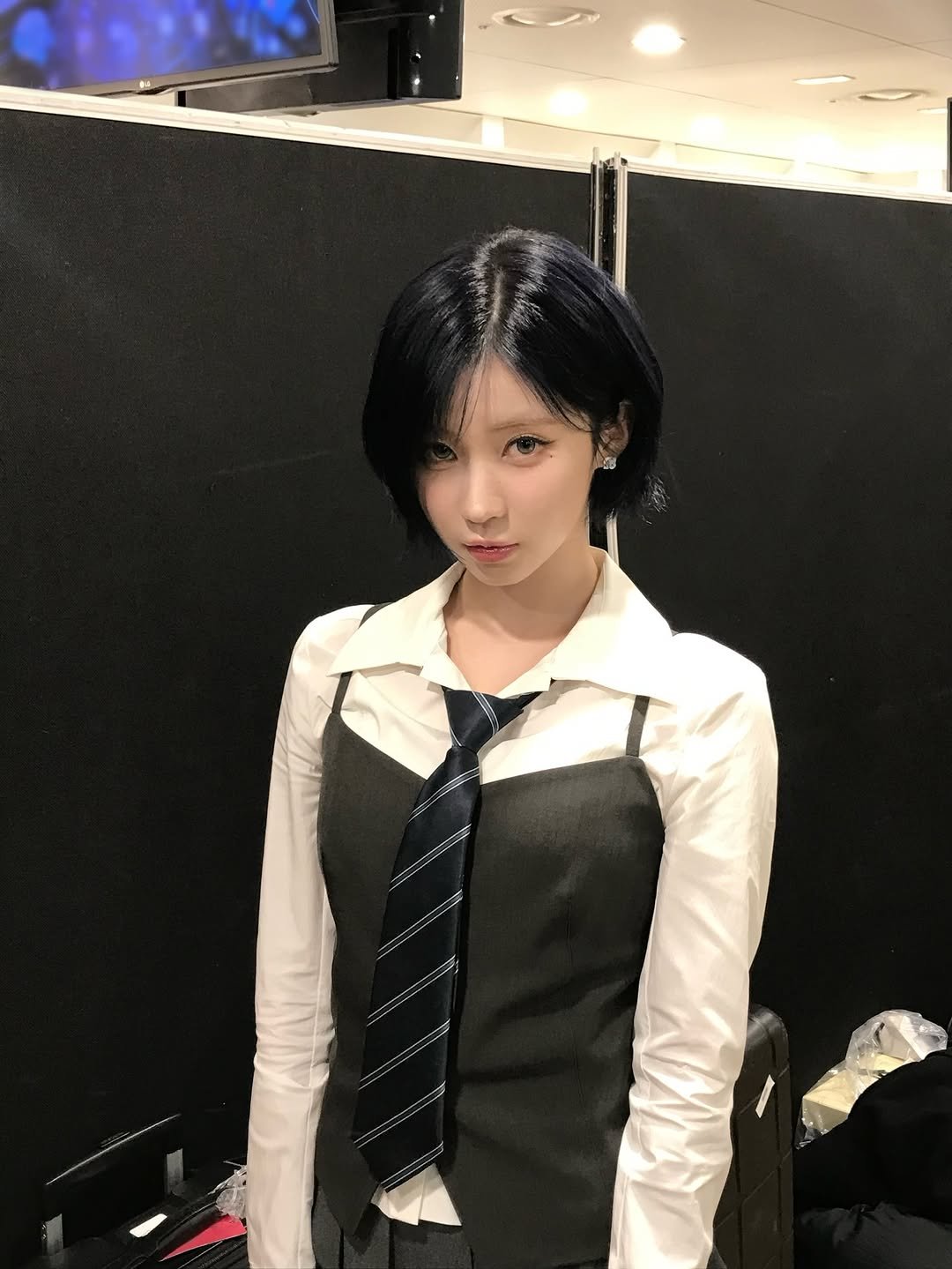 Photo by BABYMONSTER (베이비몬스터) on February 13, 2026. May be an image of one or more people, hair, suit, blazer and text.