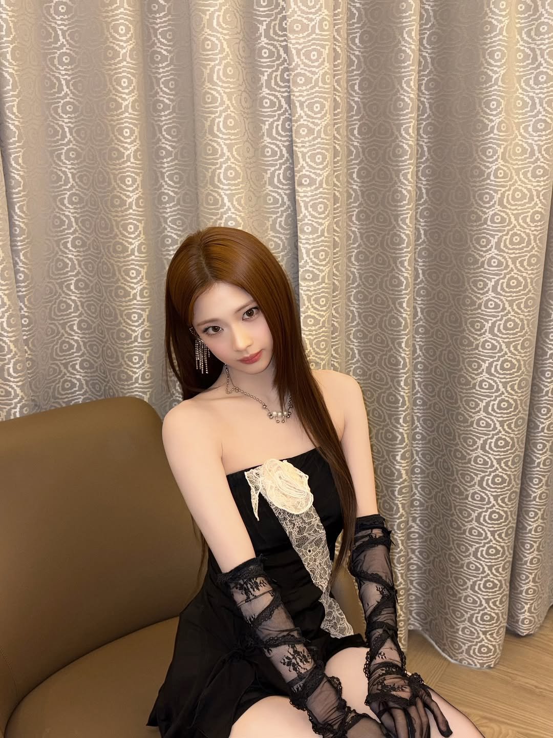 Photo by BABYMONSTER (베이비몬스터) on December 30, 2025. May be an image of costume, dress and text.