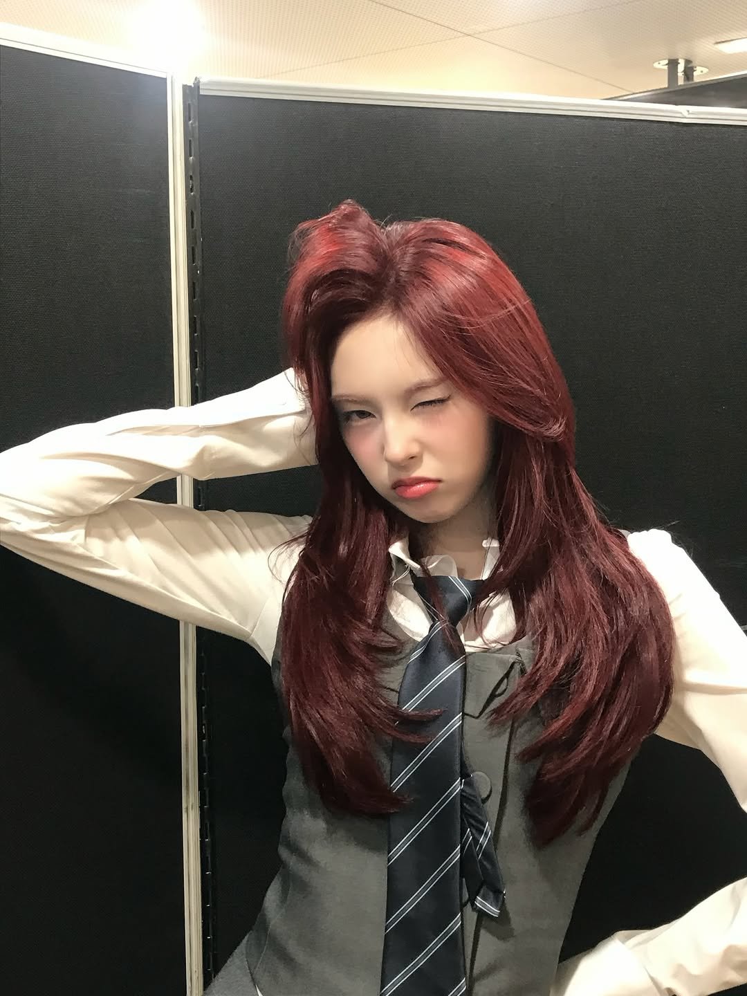 Photo by BABYMONSTER (베이비몬스터) on February 13, 2026. May be an image of one or more people, hair, bolo tie and text.