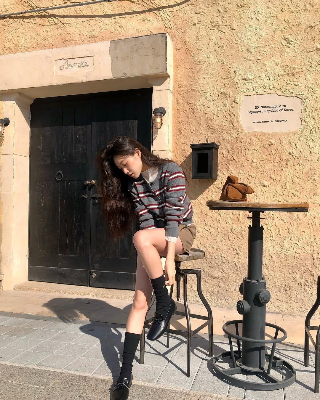 Photo shared by 🪞윤경 | 패션모델 on February 17, 2026 tagging @mindbridge_kr, and @mindbridge_women. May be an image of boots, shorts, miniskirt and text.