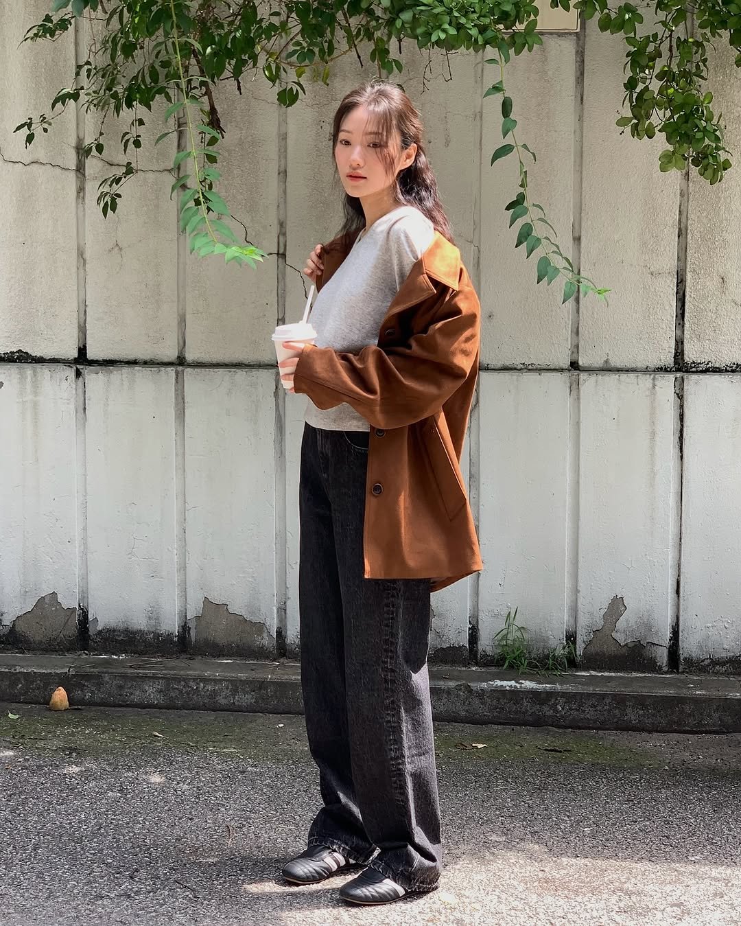 Photo shared by 🪞윤경 | 패션모델 on September 15, 2025 tagging @mongdol.official. May be an image of 1 person, duffle coat and text.