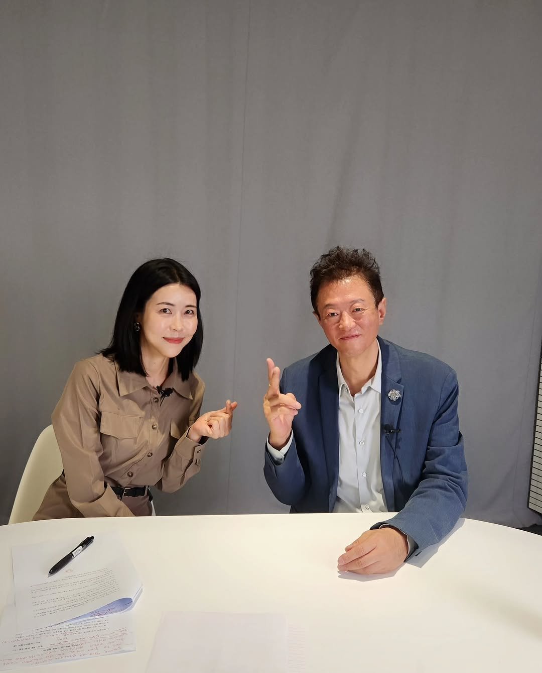 Photo by 방종임 on September 19, 2025. May be an image of 2 people, suit and text.