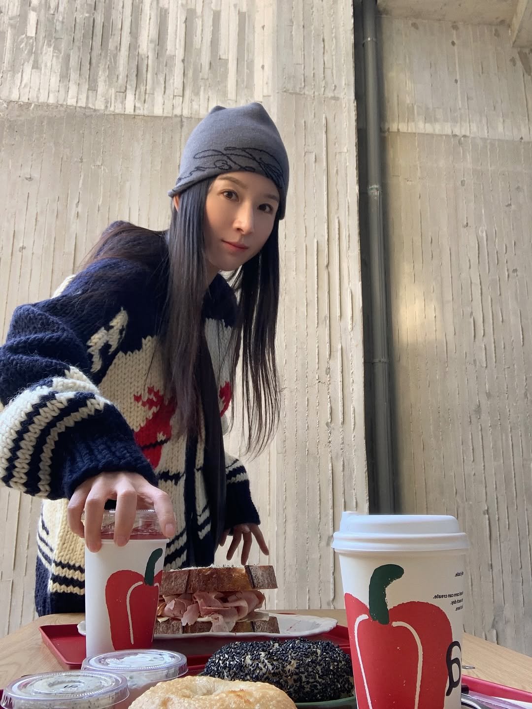 Photo by 반윤희 on November 19, 2025. May be an image of duffle coat, turnover and cornflower.