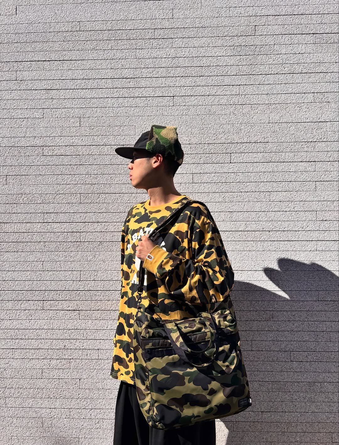 Photo shared by BAPE SEOUL on October 30, 2025 tagging @bapestorekorea, and @bape_seoul. May be an image of military uniform, parka and text.