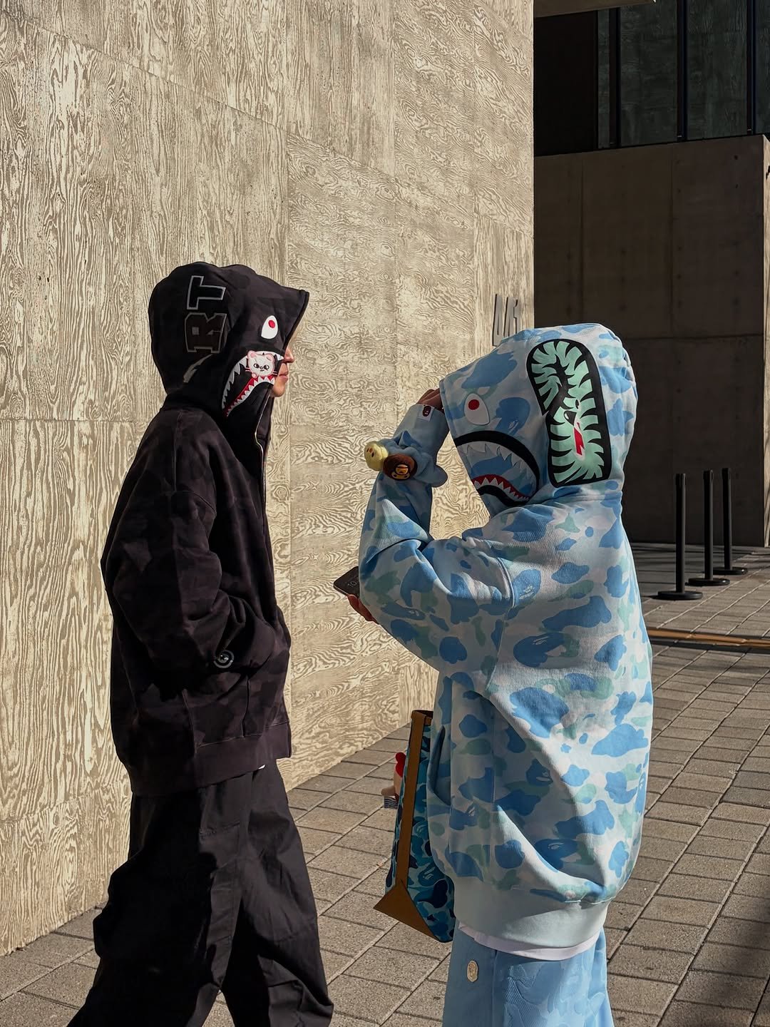 Photo shared by BAPE SEOUL on January 05, 2026 tagging @bapestorekorea, and @bape_seoul. May be an image of duffle coat, parka, gas mask, face mask, lego and text.