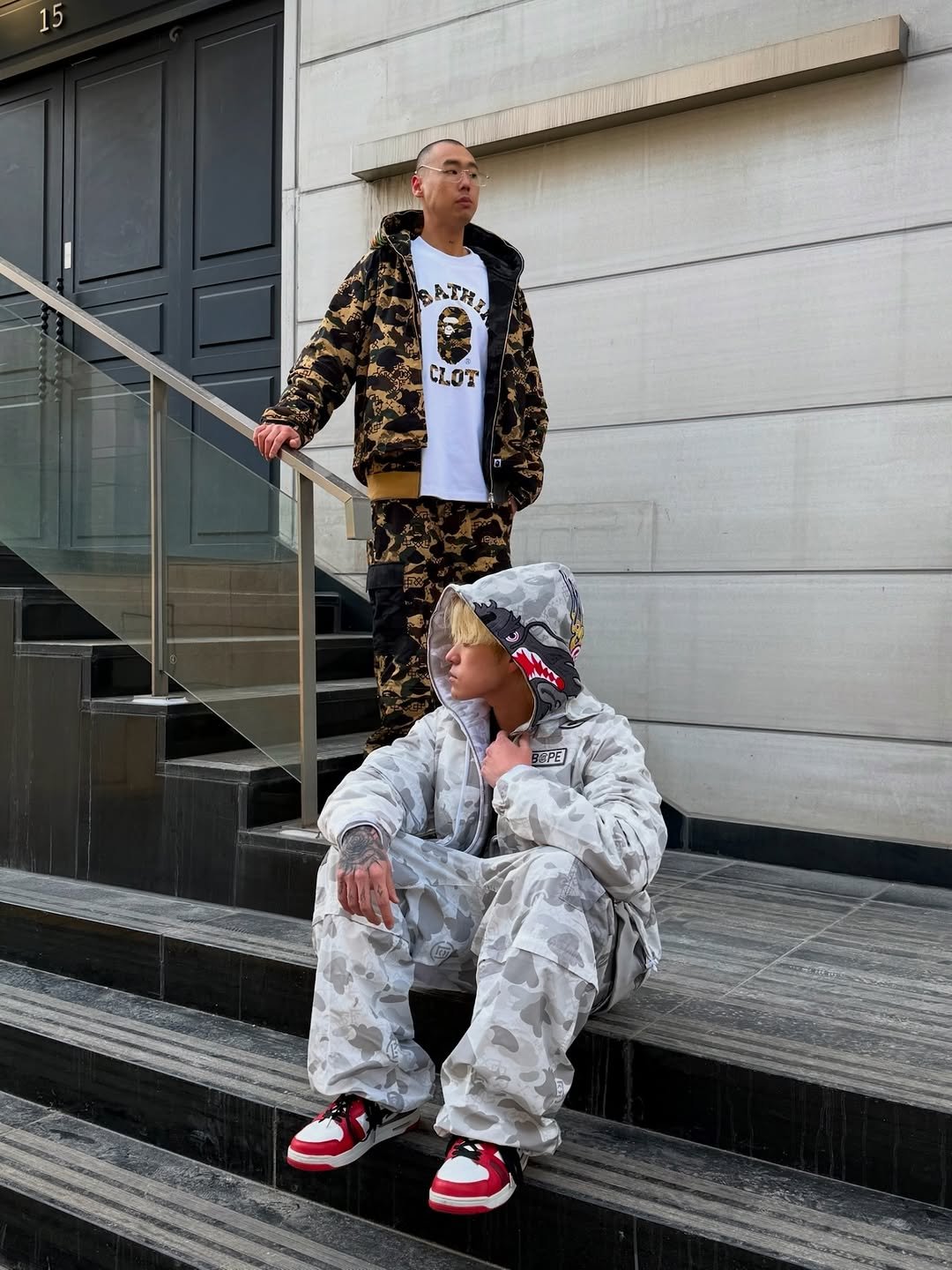 Photo shared by BAPE SEOUL on January 26, 2026 tagging @bapestorekorea, and @bape_seoul. May be an image of jacket, parka, sweatpants and text.