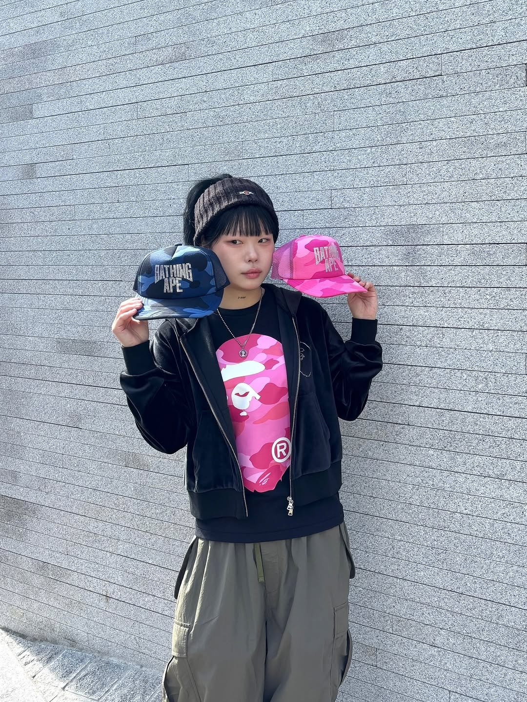 Photo shared by BAPE SEOUL on November 20, 2025 tagging @bapestorekorea, and @bape_seoul. May be an image of hat, jacket, parka, sweatpants and text.