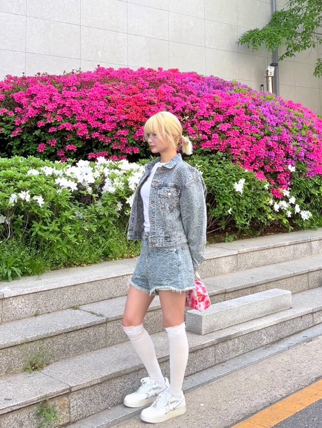 Photo shared by BAPE SEOUL on April 25, 2026 tagging @bapestorekorea, and @bape_seoul. May be an image of miniskirt and text.