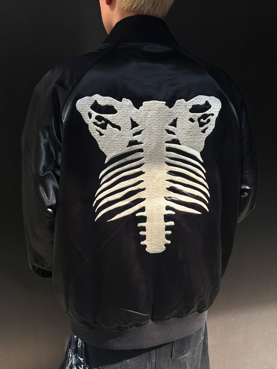 Photo shared by BAPE SEOUL on September 22, 2025 tagging @bapestorekorea, and @bape_seoul. May be an image of flight jacket and skull.