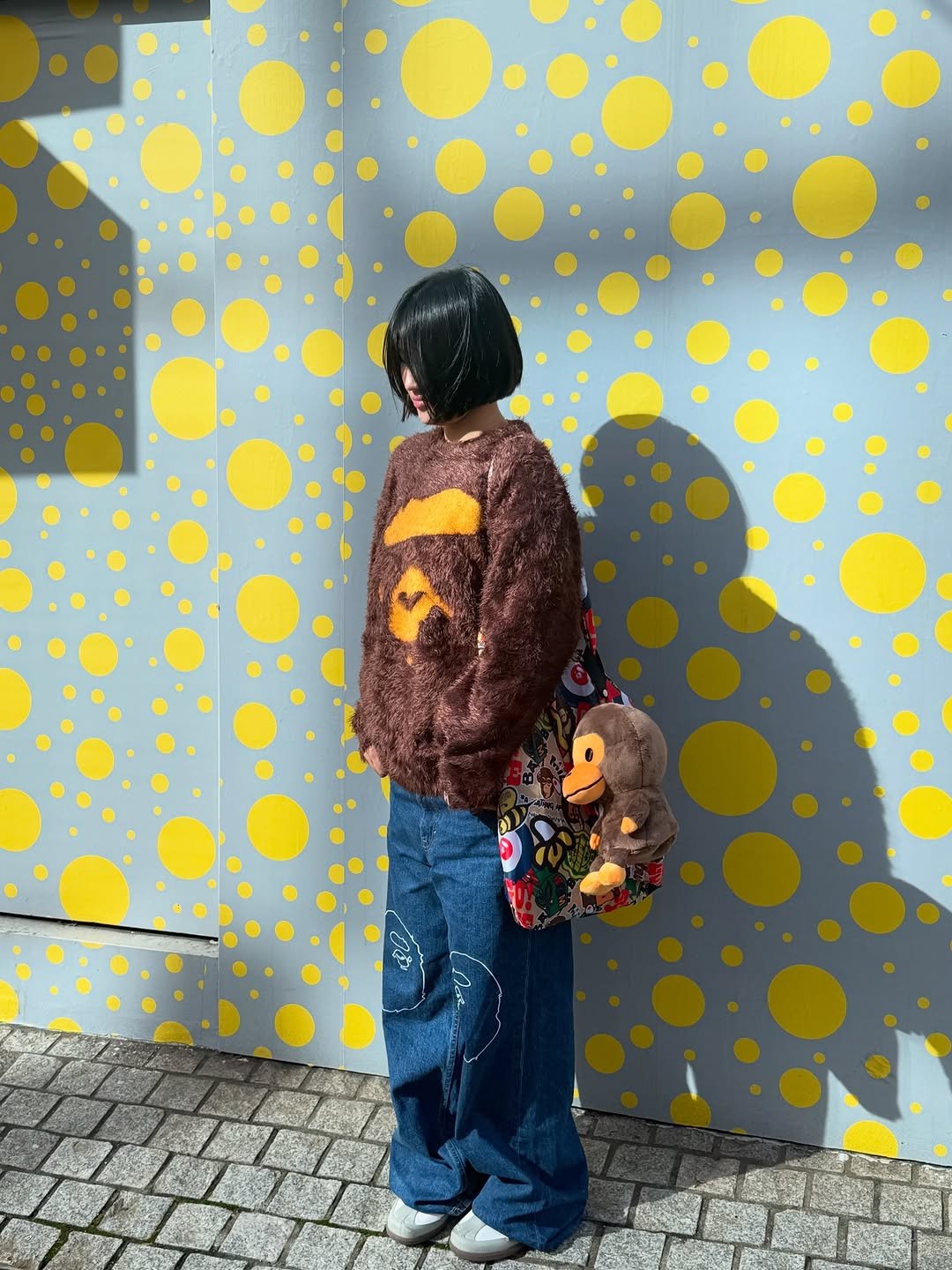 Photo shared by BAPE SEOUL on November 26, 2025 tagging @bapestorekorea, and @bape_seoul. May be pop art of duffle coat and text.