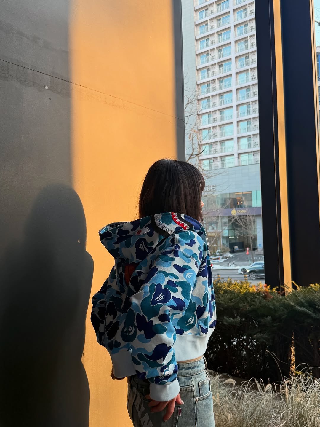 Photo shared by BAPE SEOUL on February 19, 2026 tagging @bapestorekorea, and @bape_seoul. May be an image of standing, jacket and text.