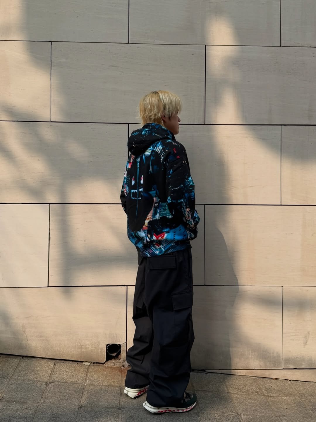 Photo shared by BAPE SEOUL on April 17, 2026 tagging @bapestorekorea, and @bape_seoul. May be an image of standing, duffle coat, skateboard, jacket, sportswear, parka, snowsuit and text.