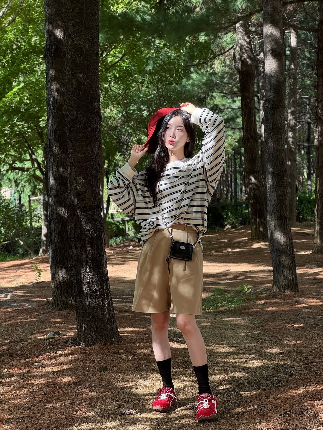 Photo shared by 김봄 | 프리랜서 배우&모델의 패션, 뷰티, vlog✨ on September 21, 2025 tagging @lazyanne_official. May be an image of 1 person, beret, miniskirt, kilt, fishnet stockings, cloak and text.