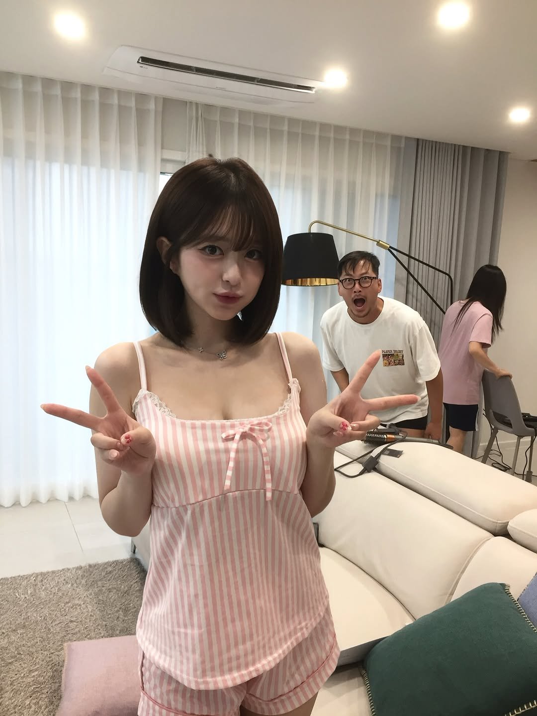 Photo by 빵귤(민지) on August 13, 2025. May be an image of 3 people, hair, sleepwear, top and text.