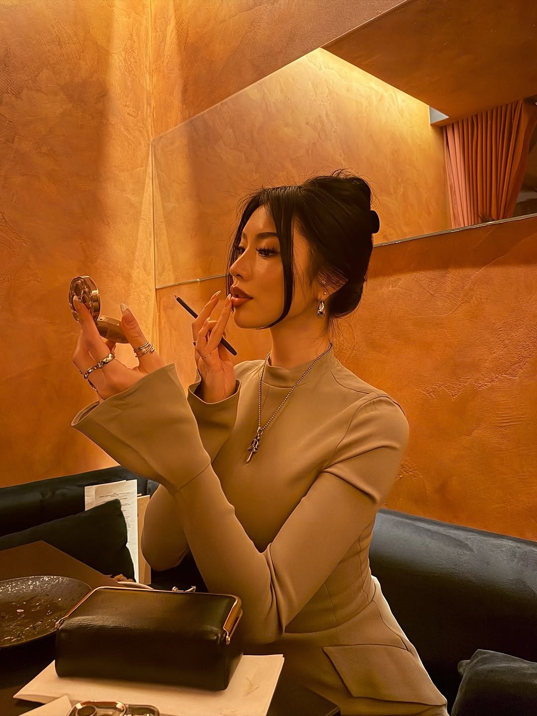 Photo by Amberly Yang on March 23, 2026. May be an image of smoking, cigarette, cigar and text.