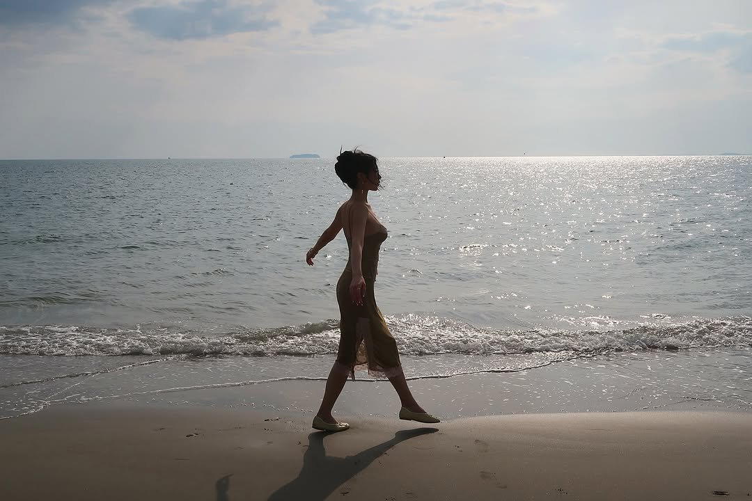 Photo by Amberly Yang on March 26, 2026. May be an image of child, beach, ocean and text.